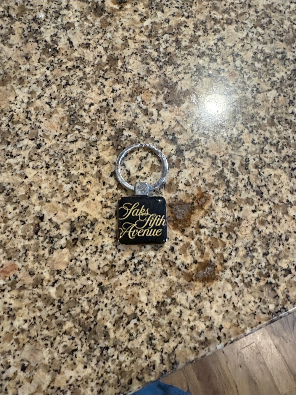 Saks Fifth Avenue Black and Gold Script Key Ring